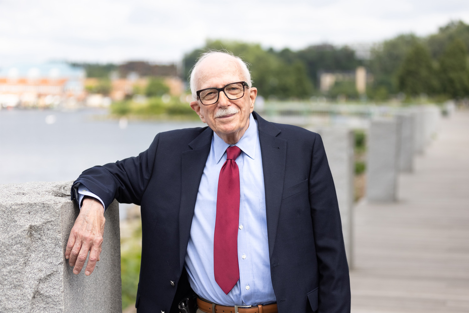 Older man smiling for a portrait