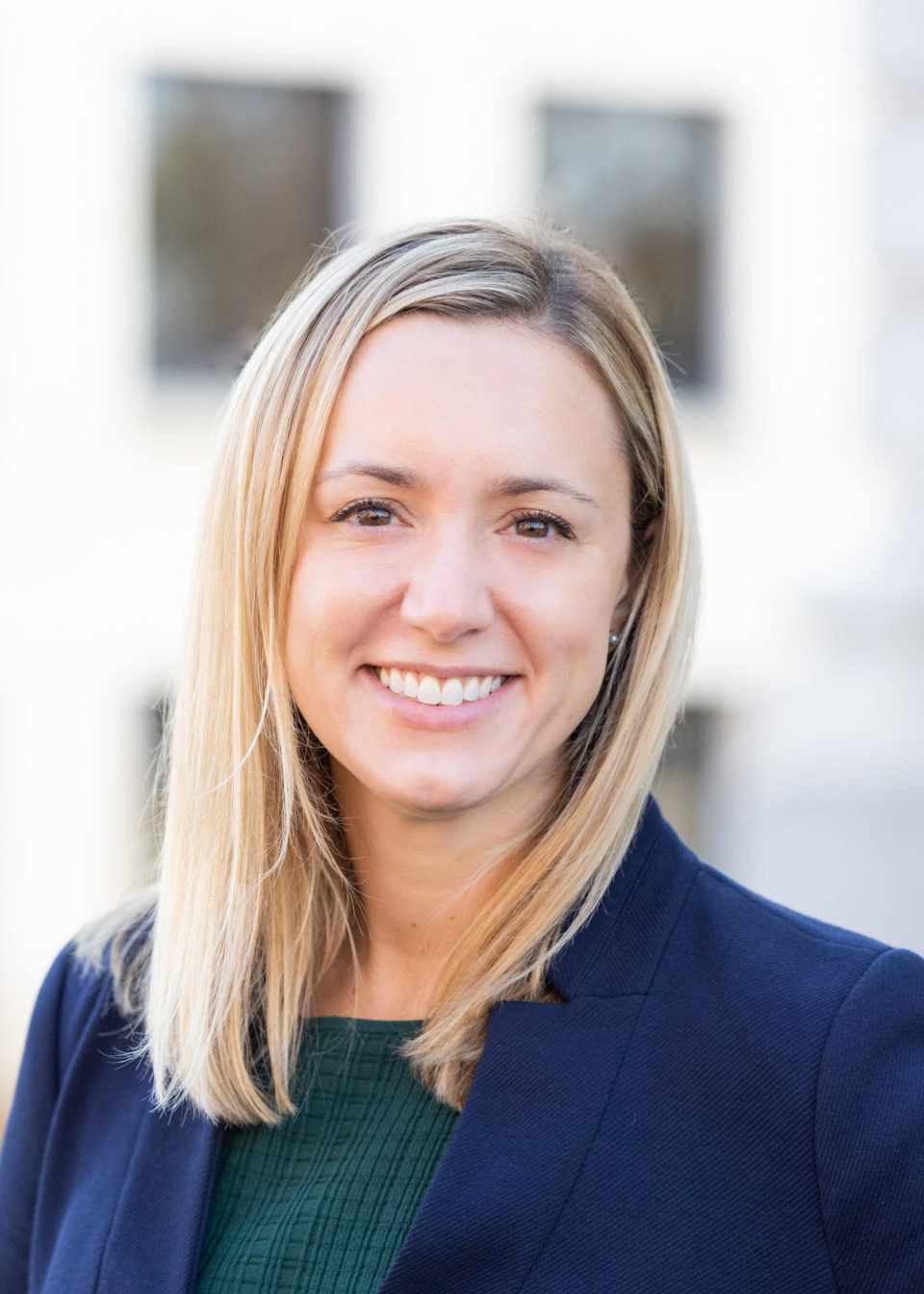 Portrait of a blonde woman in a suit