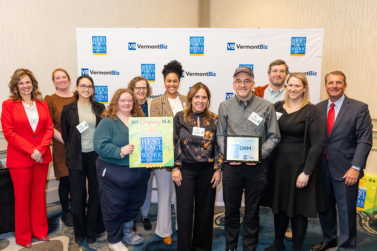 DRM Employees at Best Places to Work event holding award
